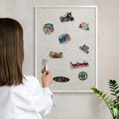 Magnetic board for travel magnets in a white frame Subtle elegance