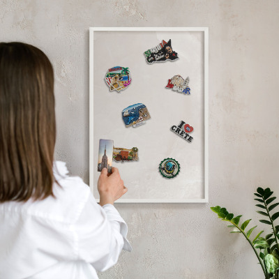 Decorative magnet board with a white frame Creamy texture