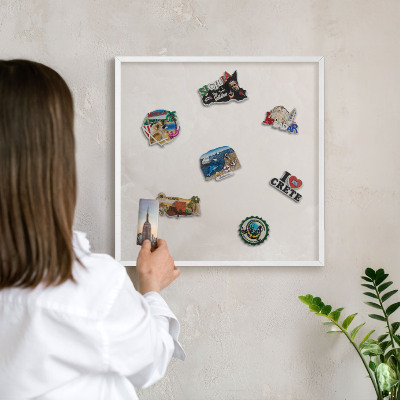 Decorative magnet board with a white frame Creamy texture