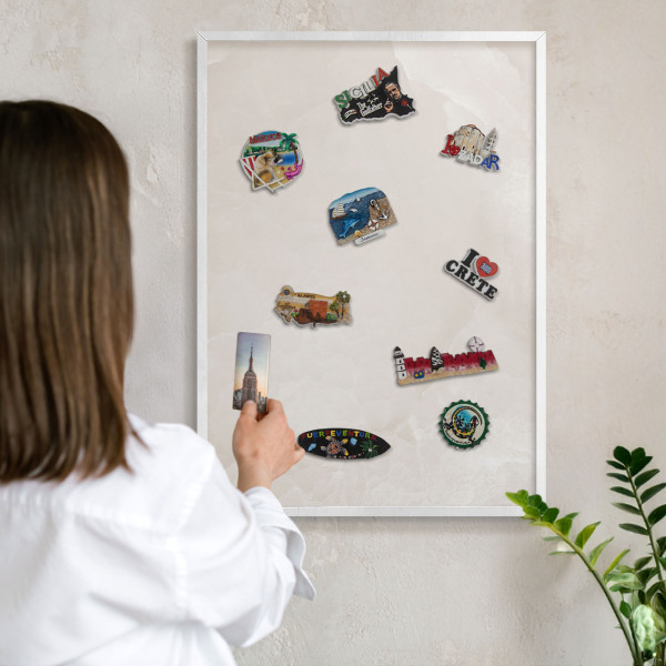 Decorative magnet board with a white frame Creamy texture