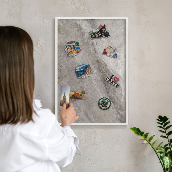 Magnetic board for travel magnets in a white frame Stone texture