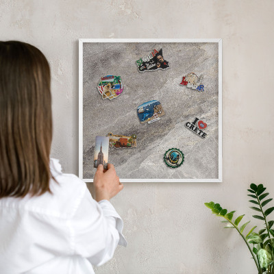 Magnetic board for travel magnets in a white frame Stone texture