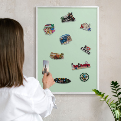 Decorative magnet board with a white frame Mint green