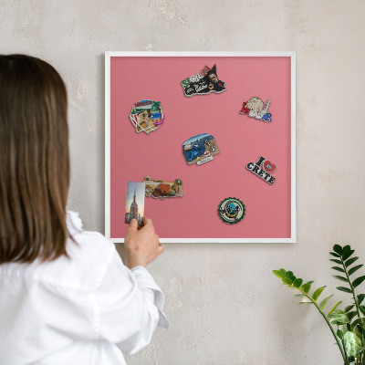 Magnetic board for travel magnets in a white frame Salmon color
