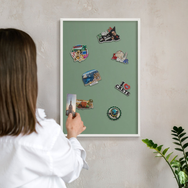 Decorative magnet board with a white frame Muted green