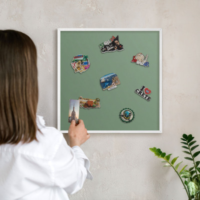 Decorative magnet board with a white frame Muted green
