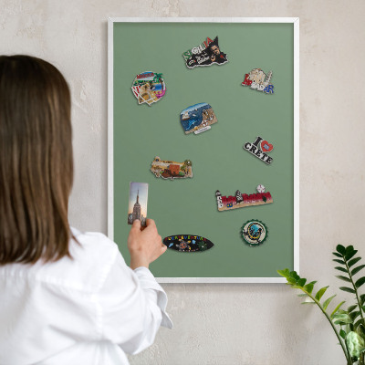 Decorative magnet board with a white frame Muted green