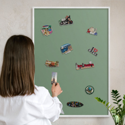 Decorative magnet board with a white frame Muted green