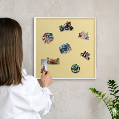 Magnetic board for travel magnets in a white frame Creamy yellow