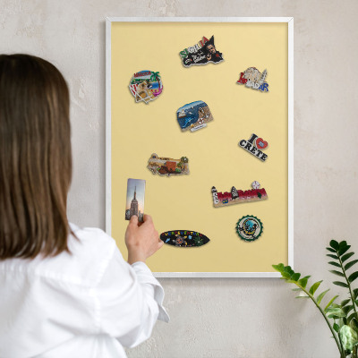 Magnetic board for travel magnets in a white frame Creamy yellow