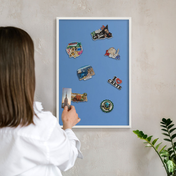Magnetic board for travel magnets in a white frame Blue color