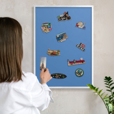 Magnetic board for travel magnets in a white frame Blue color