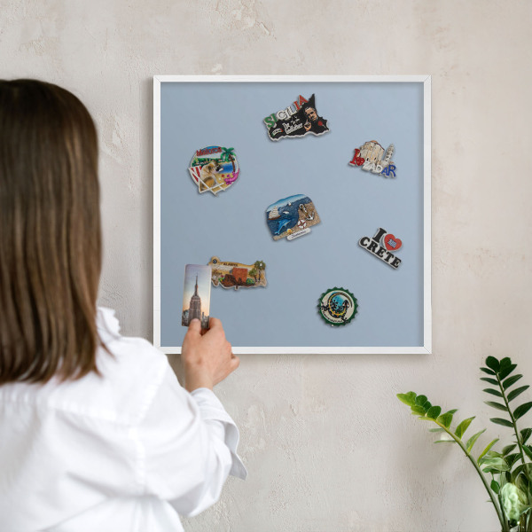 Decorative magnet board with a white frame Pastel blue