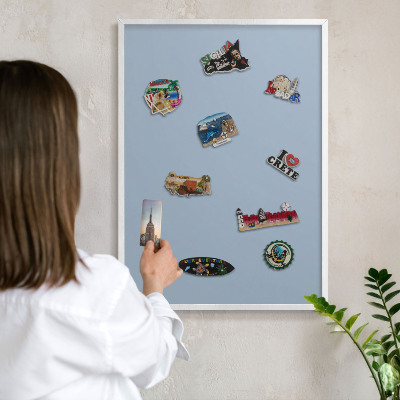 Decorative magnet board with a white frame Pastel blue