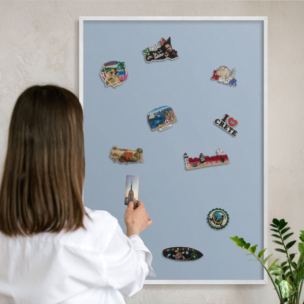 Decorative magnet board with a white frame Pastel blue