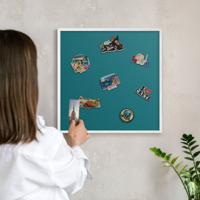 Decorative magnet board with a white frame Dark turquoise