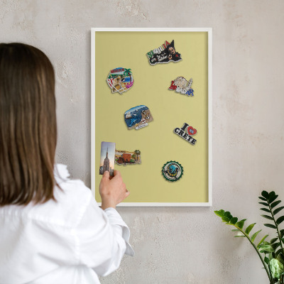 Magnetic board for travel magnets in a white frame Light mustard