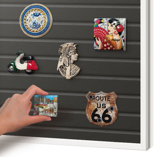 Magnetic board for travel magnets in a white frame Panel texture