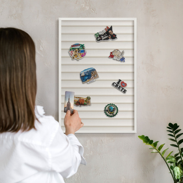 Decorative magnet board with a white frame Vertical lines