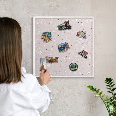 Magnetic board for travel magnets in a white frame Modern terrazzo
