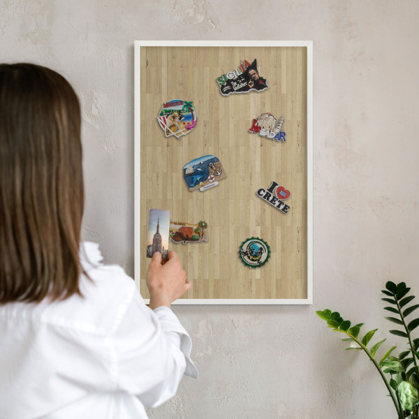 Magnetic board for travel magnets in a white frame Wooden texture