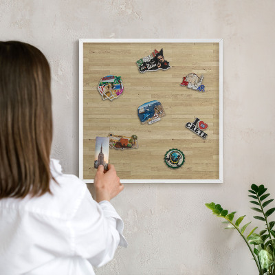 Magnetic board for travel magnets in a white frame Wooden texture
