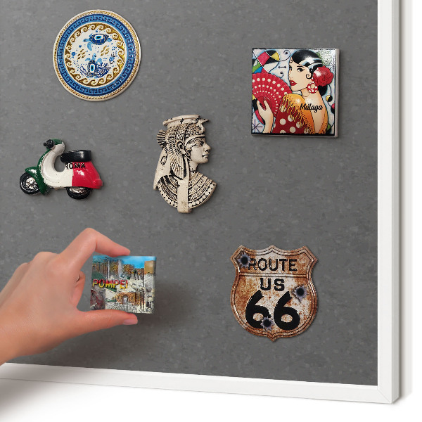 Magnetic board for travel magnets in a white frame Gray texture
