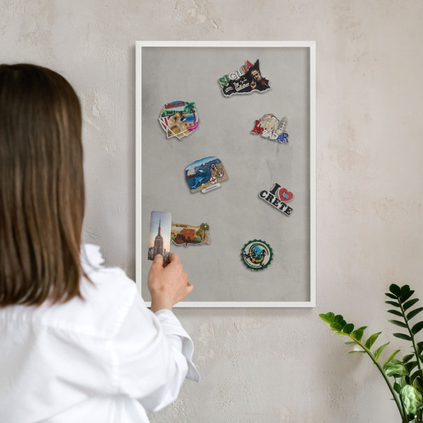 Decorative magnet board with a white frame Gray background