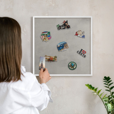 Decorative magnet board with a white frame Gray background