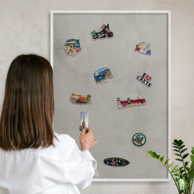 Decorative magnet board with a white frame Gray background