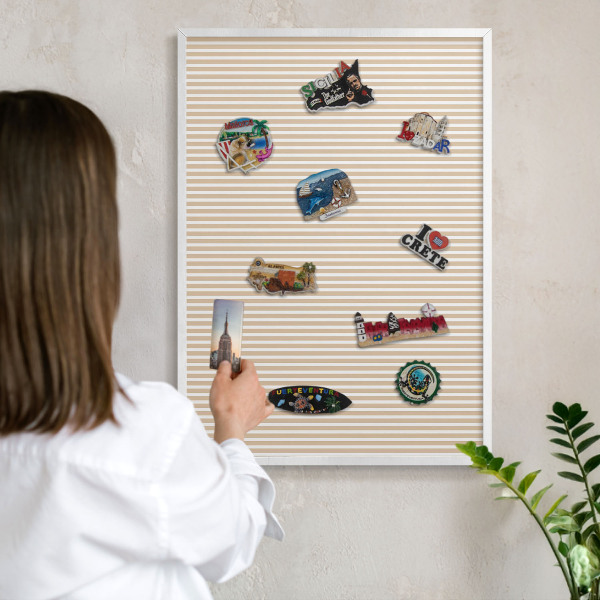Magnetic board for travel magnets in a white frame Vertical stripes