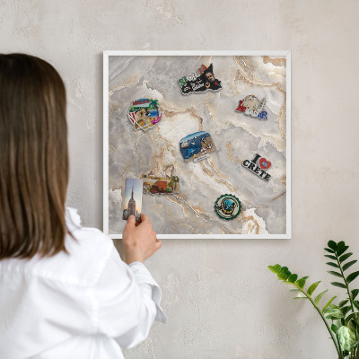 Magnetic board for travel magnets in a white frame Marble elegance