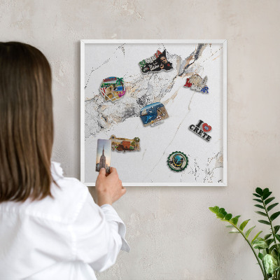 Magnetic board for travel magnets in a white frame Marble effect