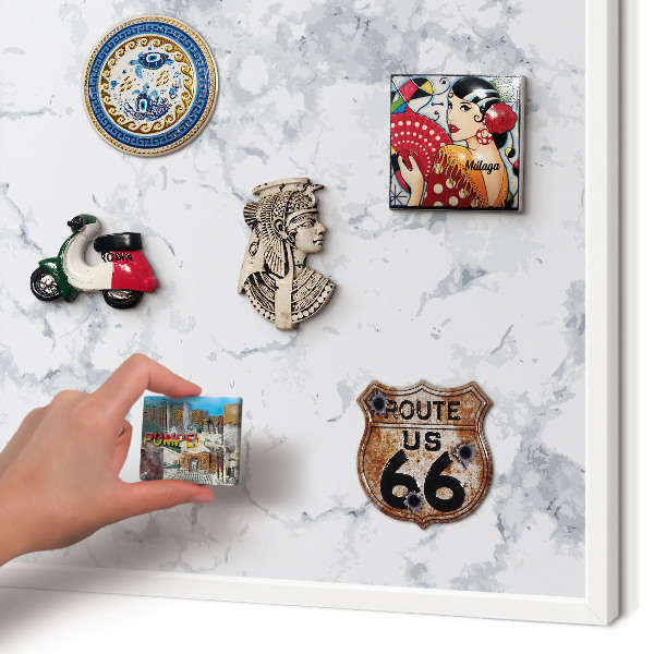 Magnetic board for travel magnets in a white frame Marble aesthetics