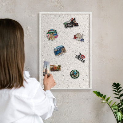 Decorative magnet board with a white frame Tiny dots