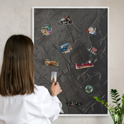 Decorative magnet board with a white frame Textured black