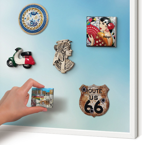 Magnetic board for travel magnets in a white frame Blue sky