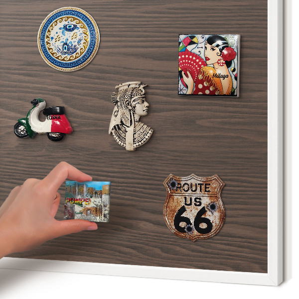 Magnetic board for travel magnets in a white frame Natural wood