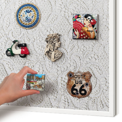Magnetic board for travel magnets in a white frame Openwork elegance