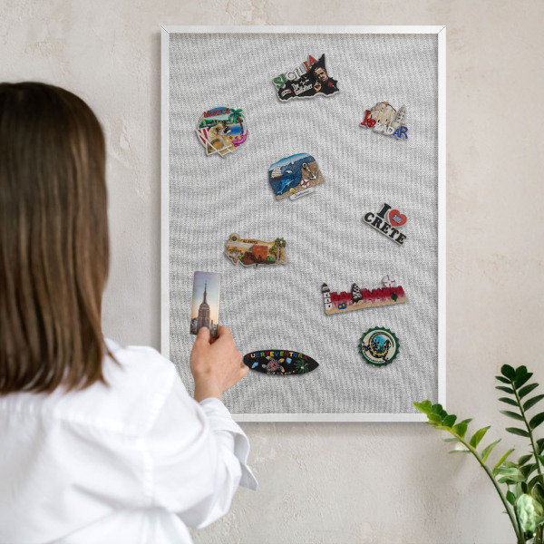 Decorative magnet board with a white frame Subtle elegance