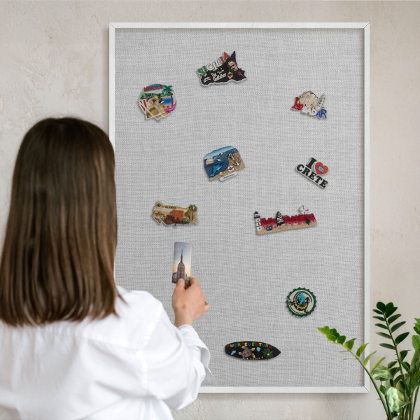 Decorative magnet board with a white frame Subtle elegance