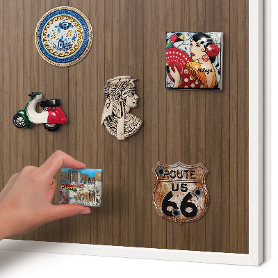 Magnetic board for travel magnets in a white frame Wooden background