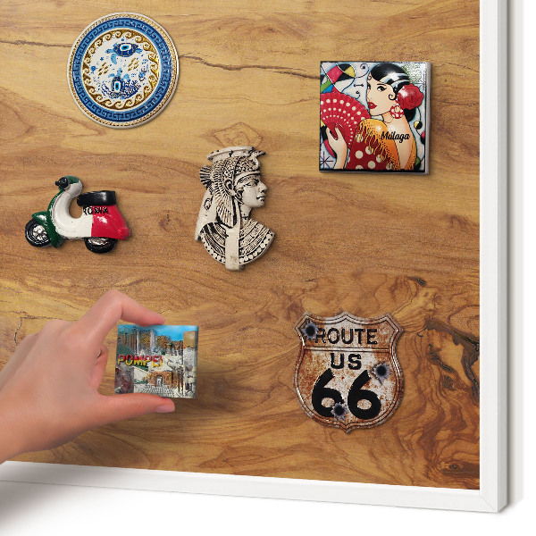 Magnetic board for travel magnets in a white frame Natural wood