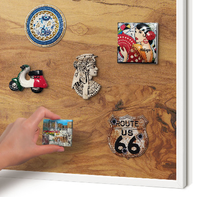 Magnetic board for travel magnets in a white frame Natural wood