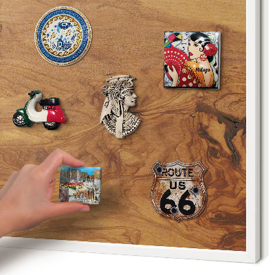 Magnetic board for travel magnets in a white frame Natural wood