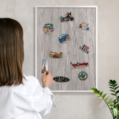 Decorative magnet board with a white frame Wooden texture