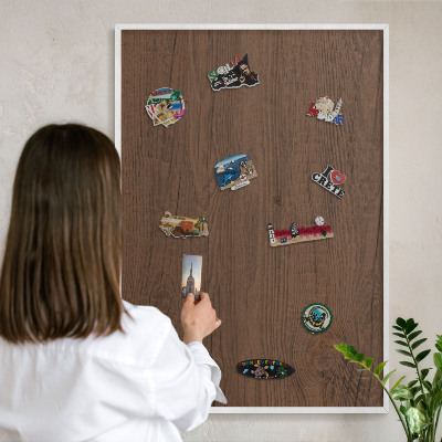 Magnetic board for travel magnets in a white frame Wooden texture