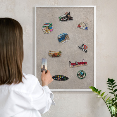 Magnetic board for travel magnets in a white frame Neutral elegance