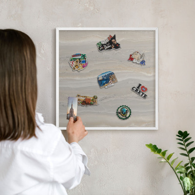 Decorative magnet board with a white frame Marble texture