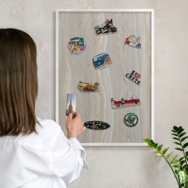 Decorative magnet board with a white frame Marble texture